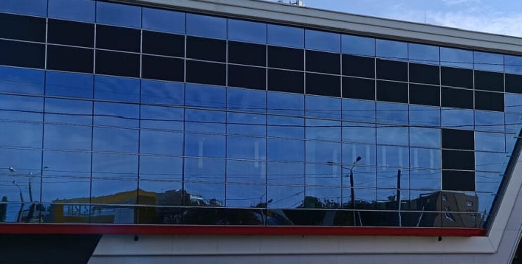 Aluminium glazed facade running the length of a commercial building