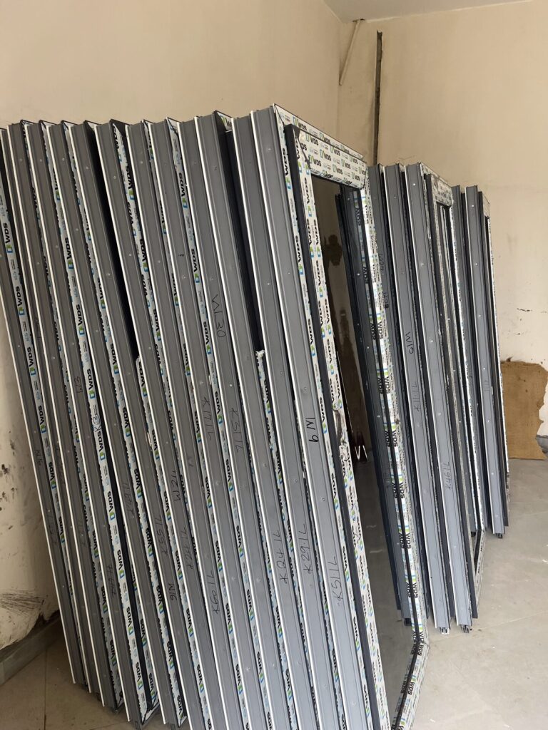Folding door panels stacked together and ready to leave the Rotex factory